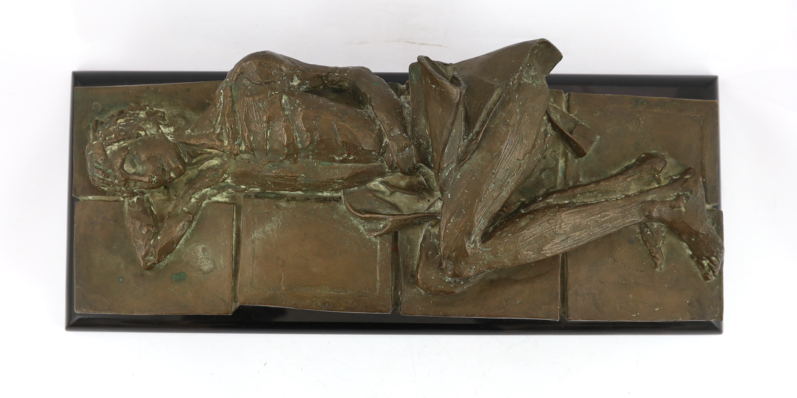 Nicola Simbari (Italian, 1927-2012), a bronze 'Reclining woman', 52.5cm wide, 18cm deep, 16cm high, on a black plinth